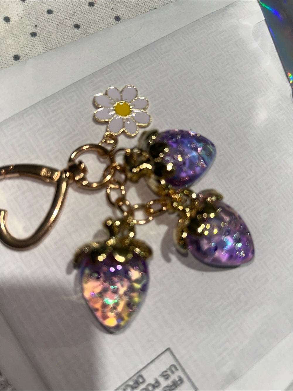 Gold Daisy Charm Keyring with Iridescent Purple Strawberry Charms